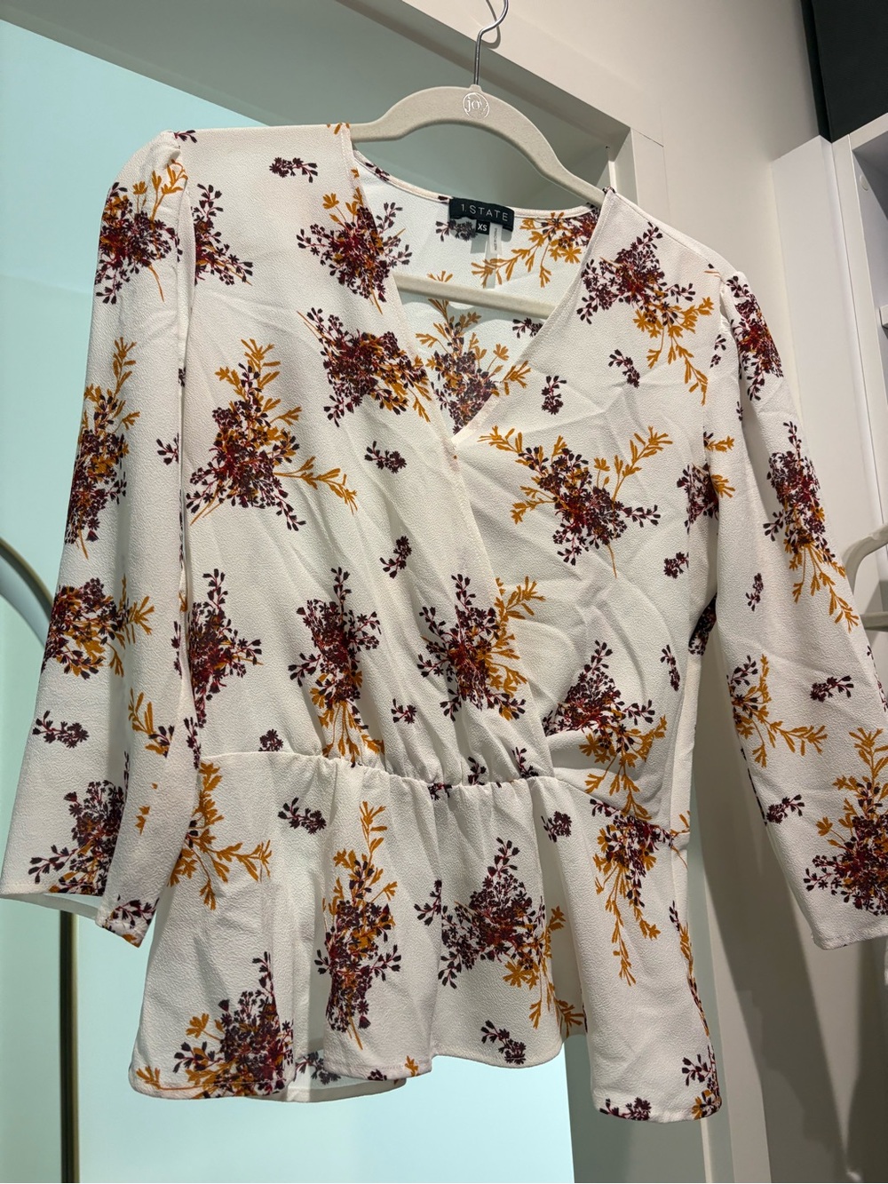 1. State White Wrap Peplum Top with Mustard & Burgundy Floral Print